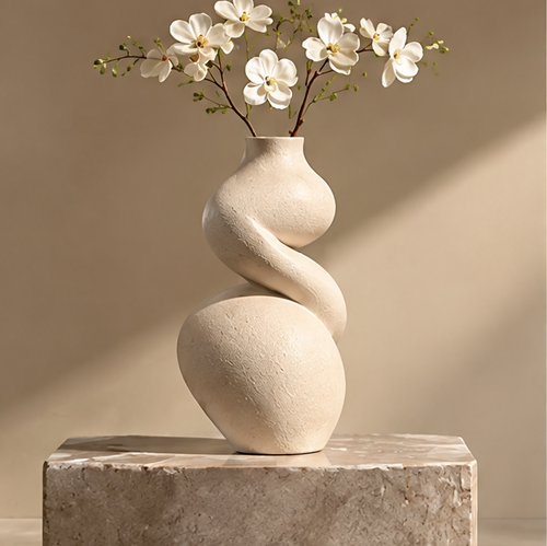 FORMIQI ivory vase close-up showing matte stone texture and natural finish