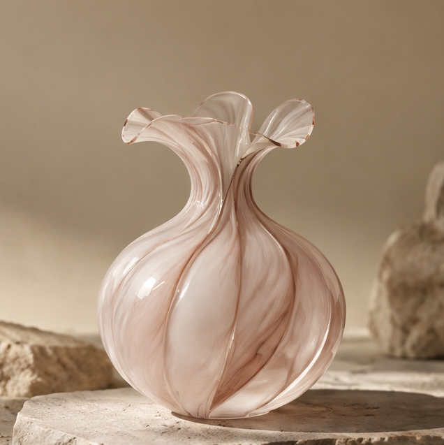 FORMIQI rose blush organic-globe ruffle-top art glass vase on stone surface, clean background