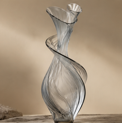 FORMIQI smoke grey hand-blown spiral-ribbon sculptural glass vase on stone surface, clean background