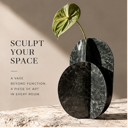 FORMIQI green marble dual-disc vase elevate the everyday, styled with anthurium on stone plinth
