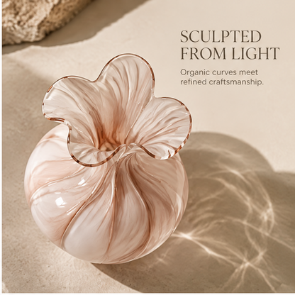 FORMIQI rose blush vase sculpted from light, top-down view showing organic petal mouth and spiral ribbing