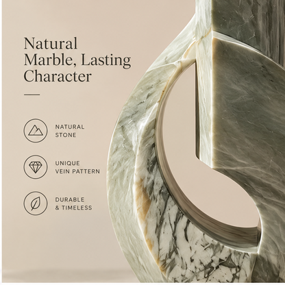 FORMIQI green marble geometric vase styled with books, sculpted for a calmer everyday